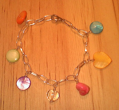 Pulsera 7 rayos concha